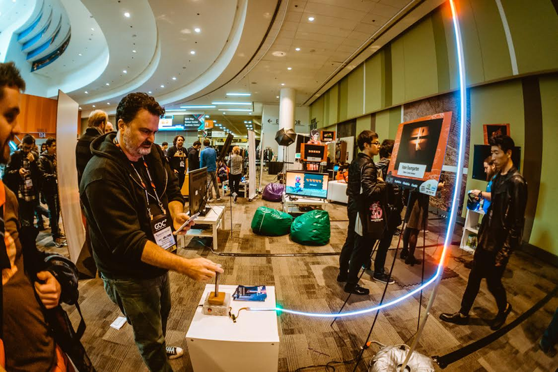 Tim Schafer trying Line Wobbler at Day Of The Devs, GDC San Francisco, USA, 2016